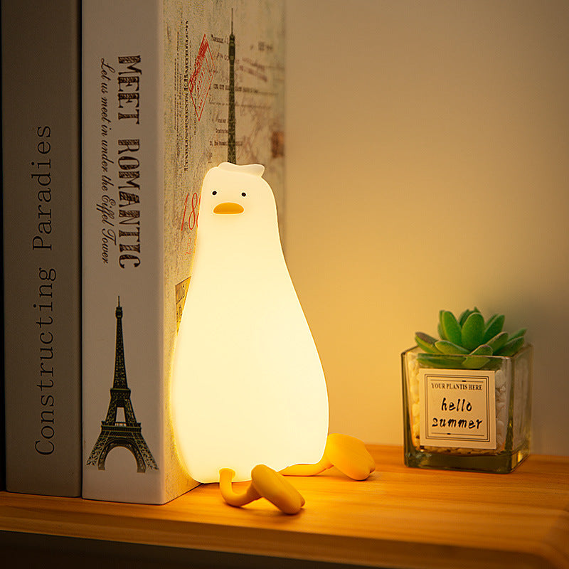 Factory new product lying flat duck night light cartoon mobile phone bracket bedroom bedside with sleeping light decompression silicone pat light